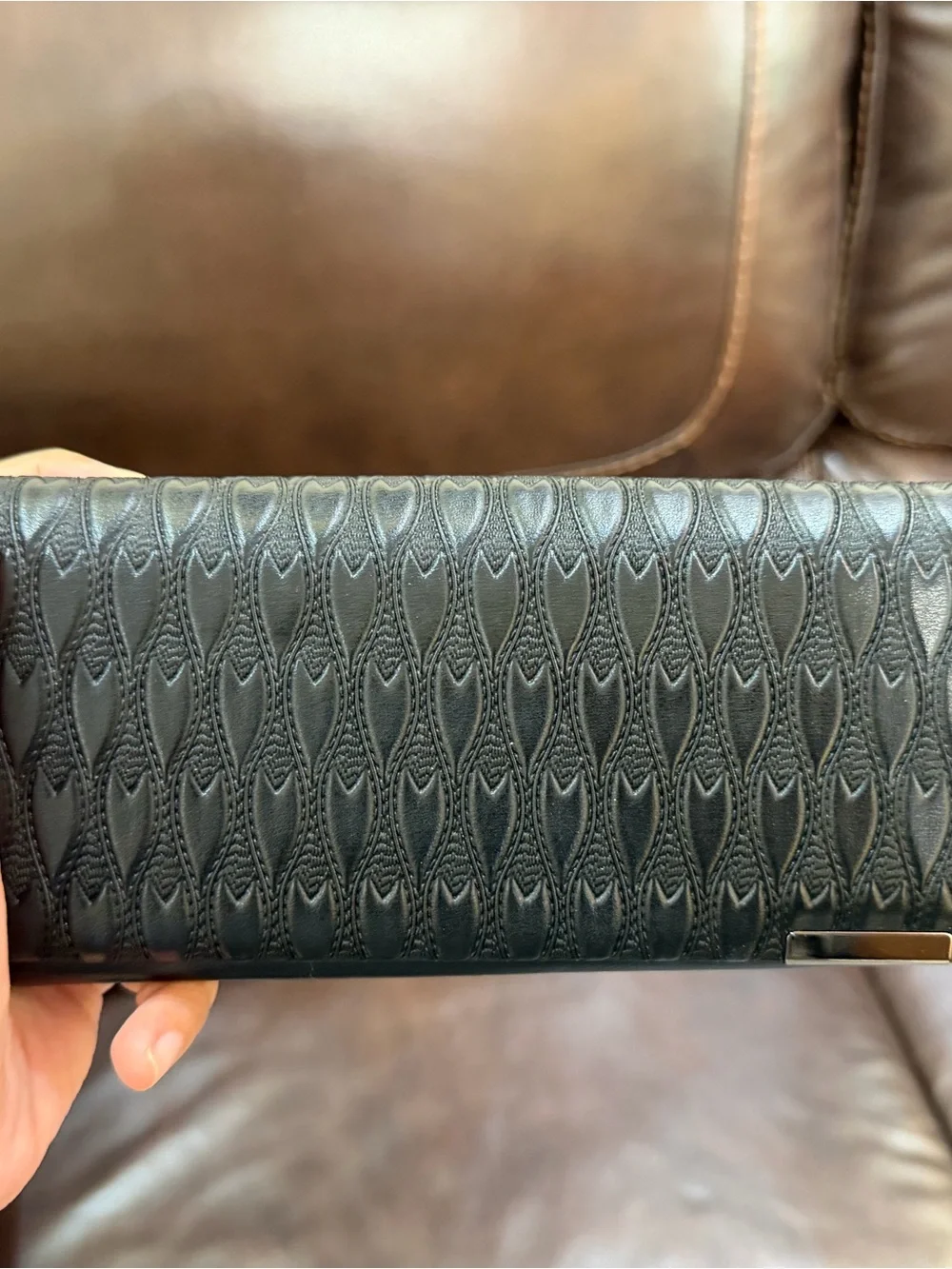 N/A black embossed